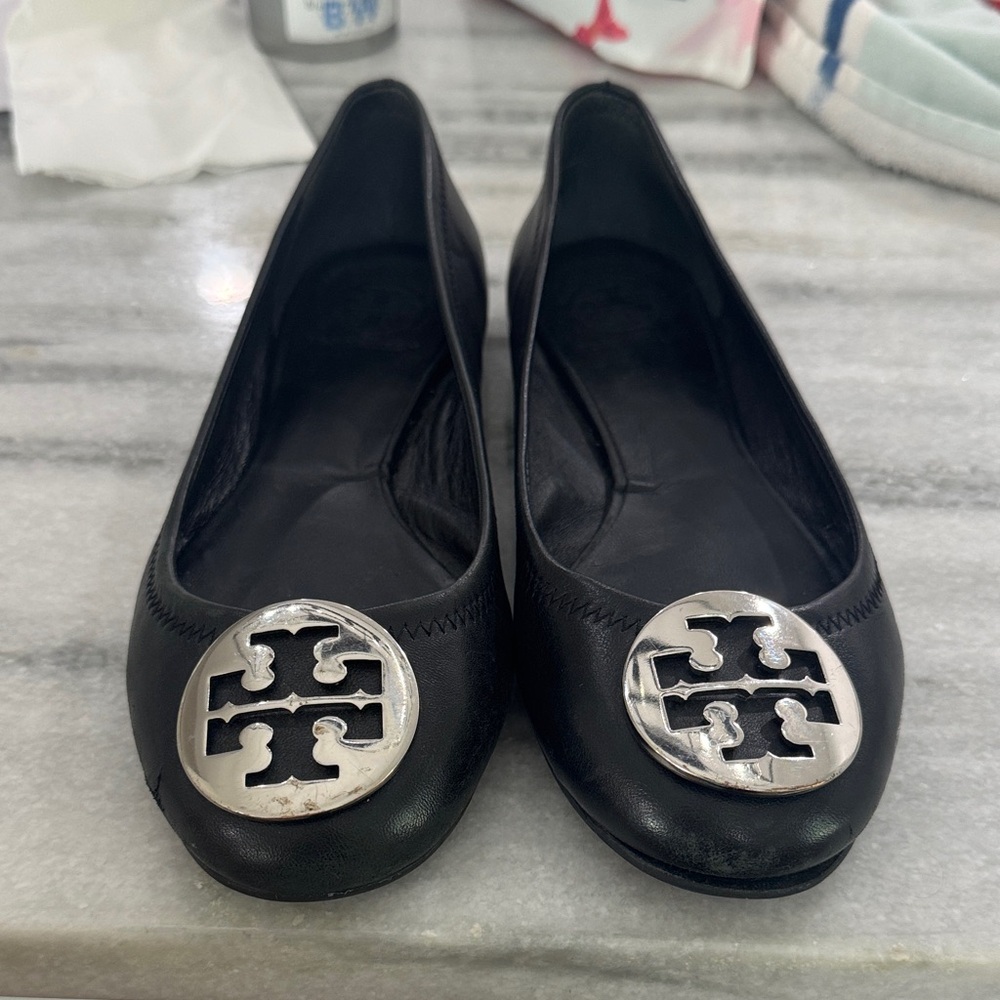 Tory Burch Black Leather Flats with Silver Logo Medallion
